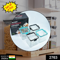 Transparent 700ml square containers with blue lids, neatly arranged for kitchen organisation.