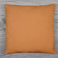A beige couch pillow cover with an invisible zipper closure for easy use.