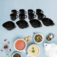 Elegant ceramic tea cups and pineapple-shaped plastic serving bowls.
