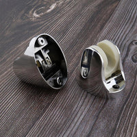 Flexible shower holder with fixing screws, ready for easy installation.