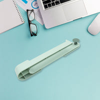 The durable plastic Wall Mounted Towel Holder displayed in a home setting.