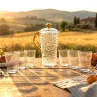 Set of tumblers matching the textured glass water jug for serving beverages