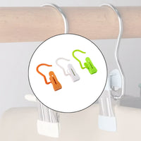 Hanging hook clip holding cloth securely using strong grip mechanism