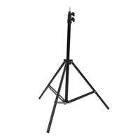 Sturdy DSLR camera tripod in a studio setting, perfect for professional photo and video.