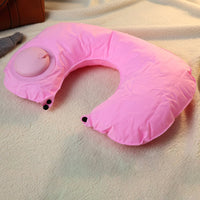 Close-up of manual air valve on inflatable travel neck pillow