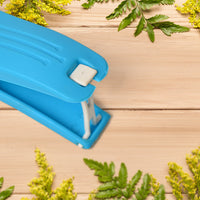 Side profile of the compact 2-in-1 vegetable cutter and peeler, showcasing its sleek design.