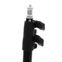 Close-up of the robust build and anti-slip feet of the professional DSLR camera tripod.