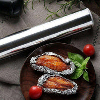 Aluminum foil roll, heavy duty and non-stick, ideal for wrapping.