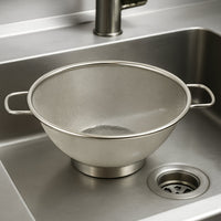 Side profile of stainless steel strainer colander with comfortable handles