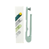 Sleek white round hook towel holder, perfect for modern bathrooms.