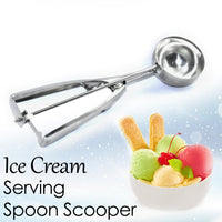 Hand holding the comfortable ergonomic handle of the ice cream serving scoop.