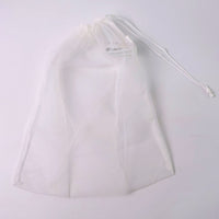 Reusable mesh storage bag showing detailed drawstring mechanism
