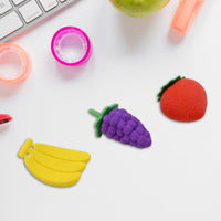 A playful pile of diverse 3D food erasers, ready for creative fun.