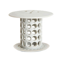 Flexible silicone sink and tub hair catcher strainer in use