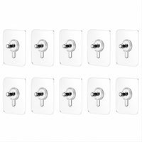 Kitchen utensil hanging on adhesive wall hook