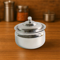 Top-down view of the Stainless Steel Ghee Pot with its lid and ladle.