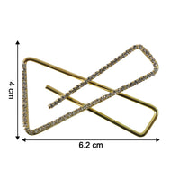 Close-up of golden crystal triangle brooch for scarf styling