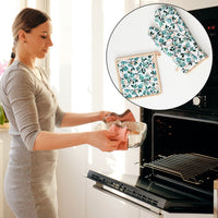 Durable cotton oven mitt for protecting hands from hot surfaces.