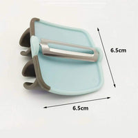 A versatile kitchen tool, the Palm Peeler efficiently peels various produce.