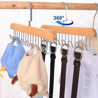 Innovative rotating hook design on the Organivo lotus wood hanger for easy access.