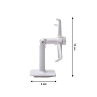 Set of six rotating self-adhesive hooks neatly installed on a kitchen wall.