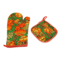 Cotton oven mitt safely holding a hot baking dish.