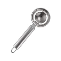 Angled view of the stainless steel egg white separator, a practical cooking gadget.