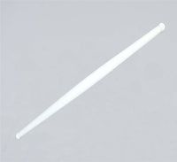 Clean white plastic rolling pin resting on a modern kitchen countertop, ready for use.