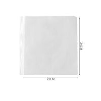 Oil-absorbing cooking paper used for draining excess oil from freshly fried pakoras.