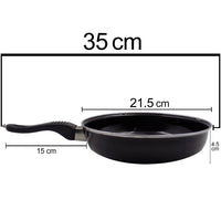Close-up of the induction base of the nonstick fry pan.