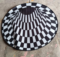 Full view of 3D space round carpet showcasing checkered pattern