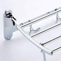 Space-saving folding towel rack in its collapsed position, ideal for small bathrooms.