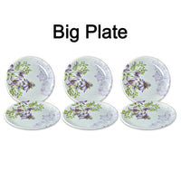 High-quality 32-piece plastic tableware set displayed on a table.