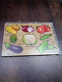Close-up of smooth, chunky wooden vegetable puzzle pieces, safe for little hands.