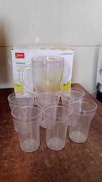 Clear polycarbonate beverage jug and glasses set for daily use