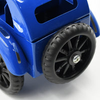 Side view of the metal car, highlighting its durable build.