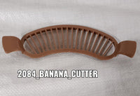 Compact plastic banana cutter with comfortable grip for daily use.