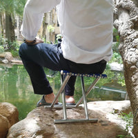 Diagram illustrating the compact dimensions and effortless folding mechanism of the portable outdoor chair.