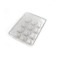 Hand placing an egg into the 12-cavity egg organiser for neat storage.