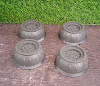 Vibration dampening pads with suction cups for washing machine