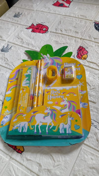 Compact stationery set with pencils, sharpener, and ruler, perfect for daily use.