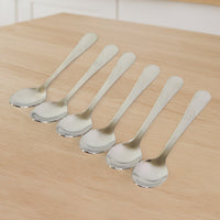 Close-up view of stainless steel dining spoons highlighting their sleek design