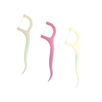 Portable MintGuard floss picks ensuring fresh breath on the go.