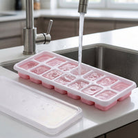 Easy release ice cube tray with lid in freezer