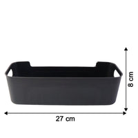 Black plastic storage baskets used for home organization