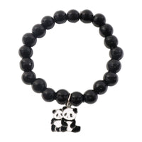 Black beaded stretch bracelet with panda charm shown on a person’s wrist.