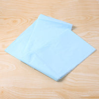 Disposable plastic table cover protecting table edges effectively