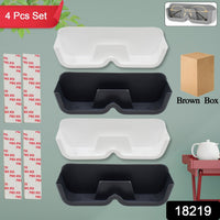 Four-piece wall mounted sunglasses holder set, neatly displaying multiple pairs of glasses.