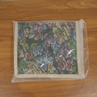 In-use floral carry hand bag for shopping or travel