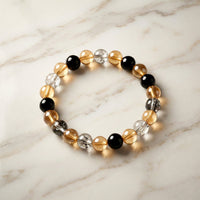 Close-up image of glossy crystal beads on the Dual-Tone Stretch Bracelet